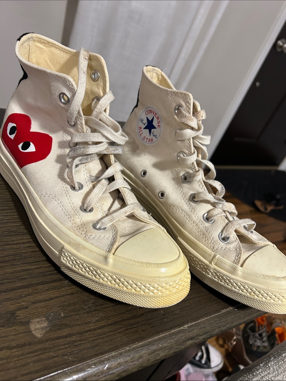 Converse PLAY Chuck Taylor High Tops in Cream with Red Heart